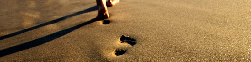 a footprint in beach sand