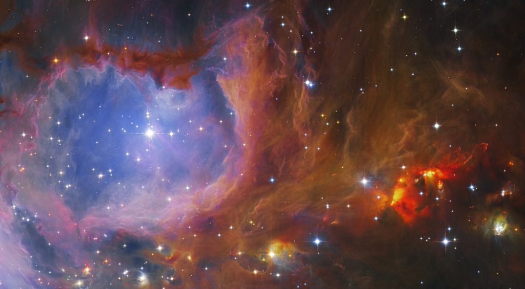 picture of deep space: stars and colorful cloud-like surroundings